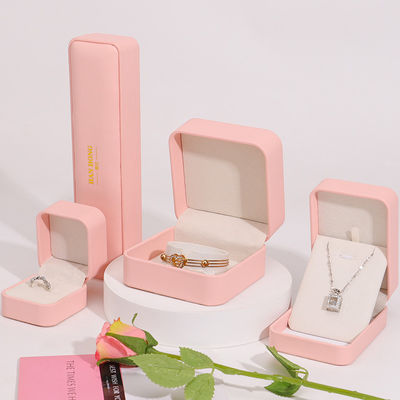 özelleştirilebilir logo mücevher kutusu üst düzey el yapımı pembe deri mücevher kutusu ambalajı